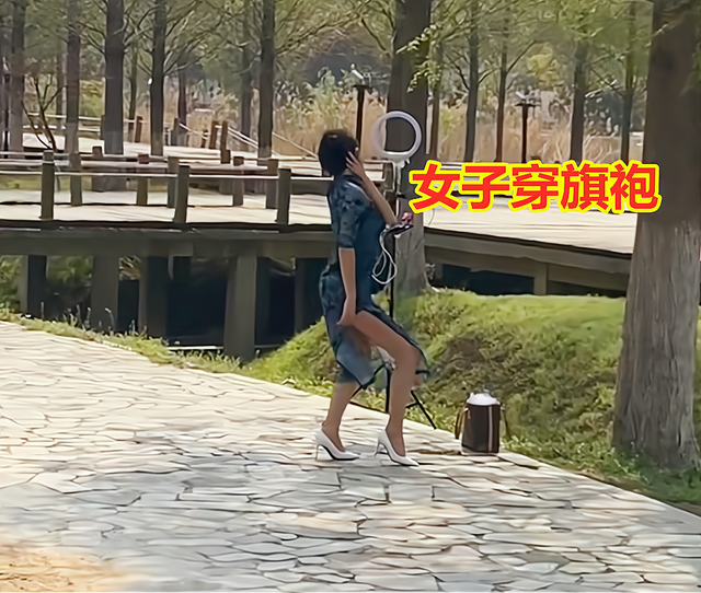 女子穿高叉旗袍跳舞，外卖小哥路过外卖都不想送了，看得津津有味