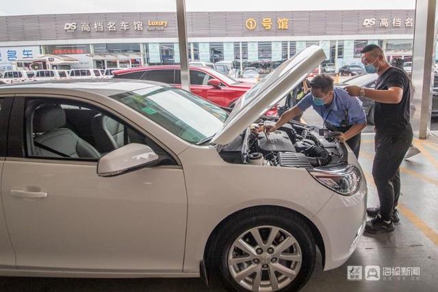 记者探访济南二手车交易首日“跨省通办”两小时即可完成换牌